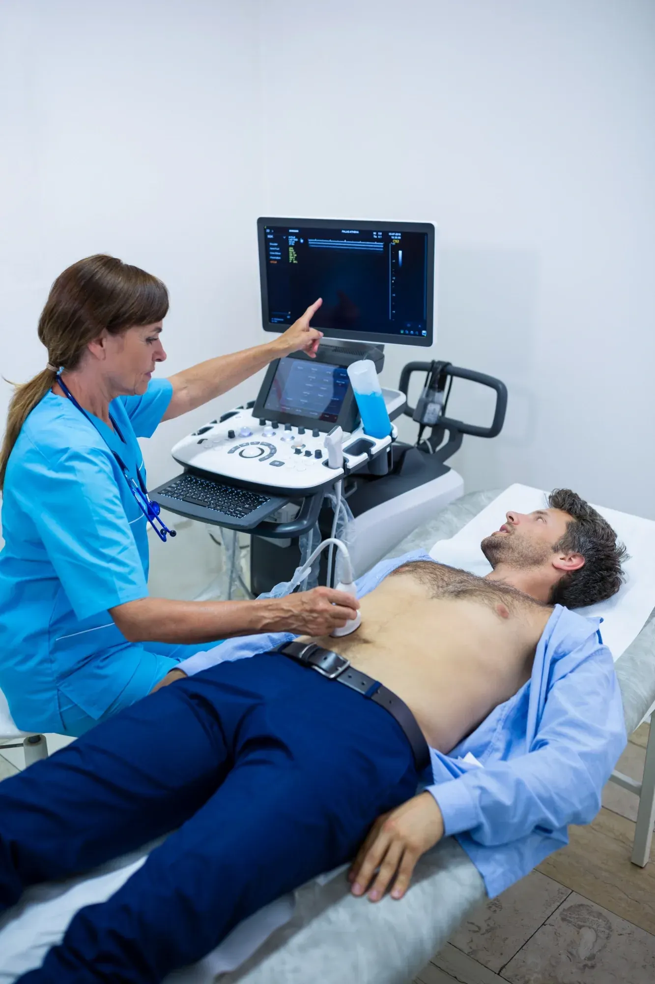 Patient comfortably seated during a non-invasive bladder ultrasound at Zabinski Urology