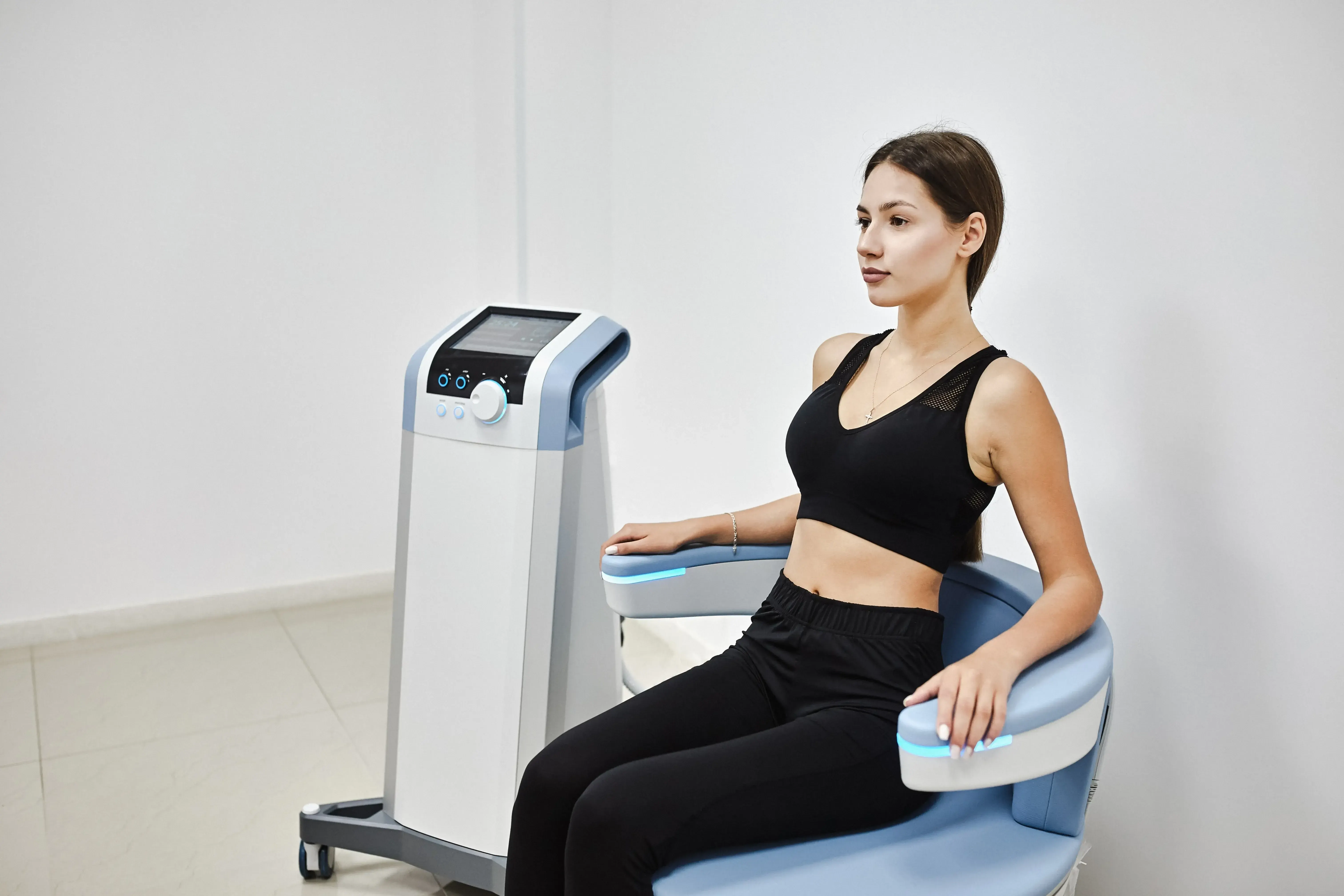 Confident patient considering Emsella pelvic floor therapy