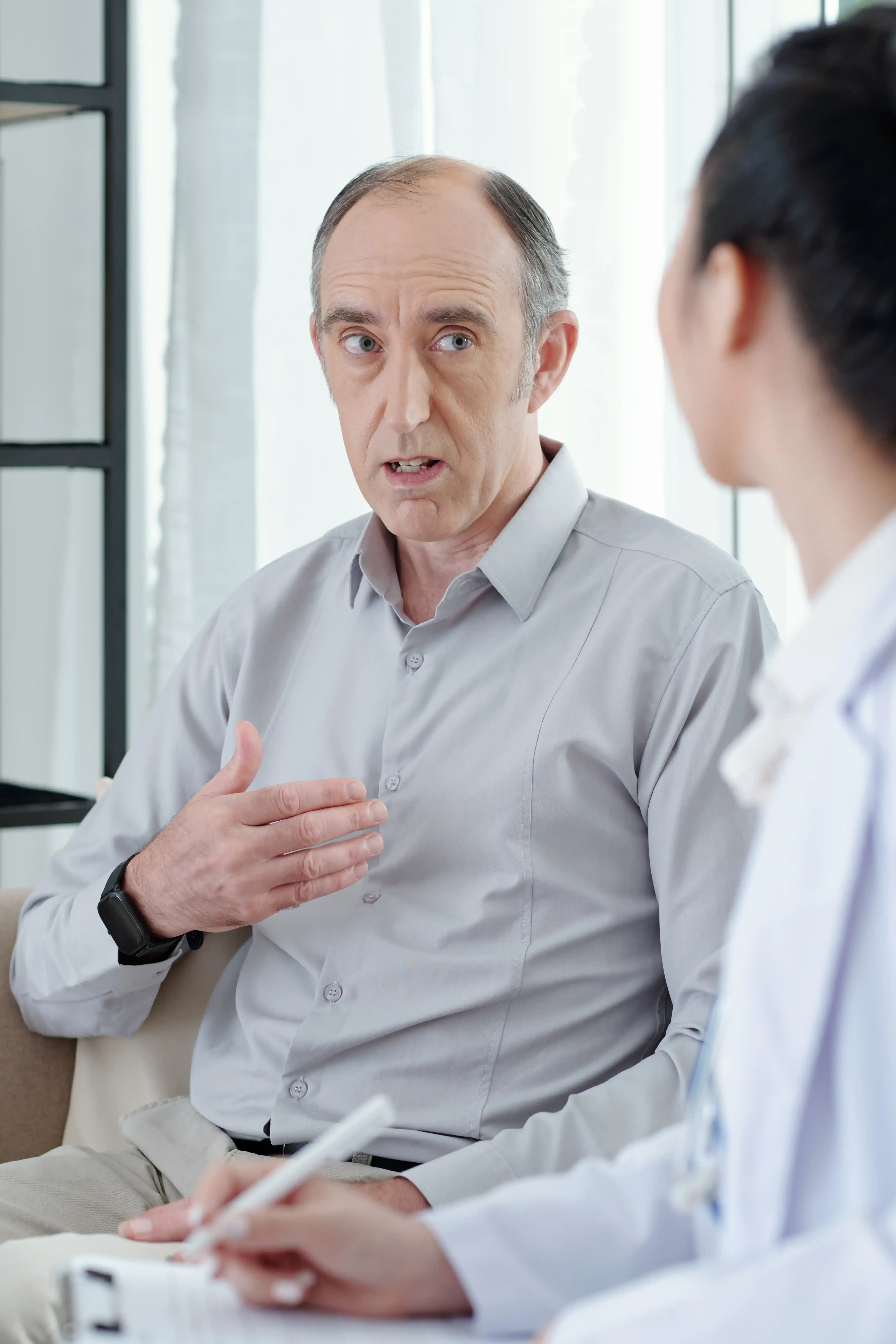 Patient learning about enlarged prostate BPH diagnosis at Zabinski Urology Melbourne