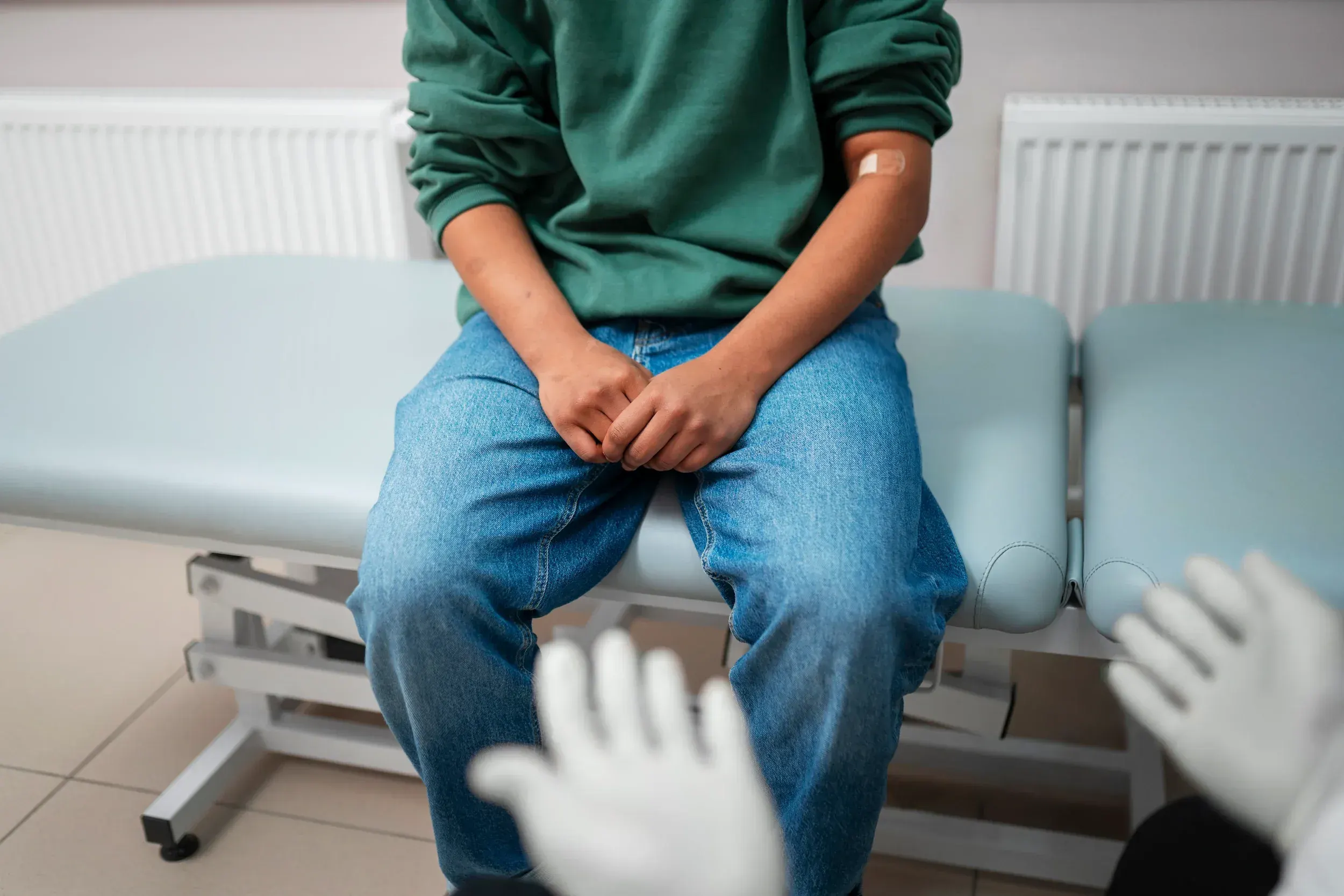 Patient consulting with a urologist about prostatitis symptoms in a Melbourne, FL clinic