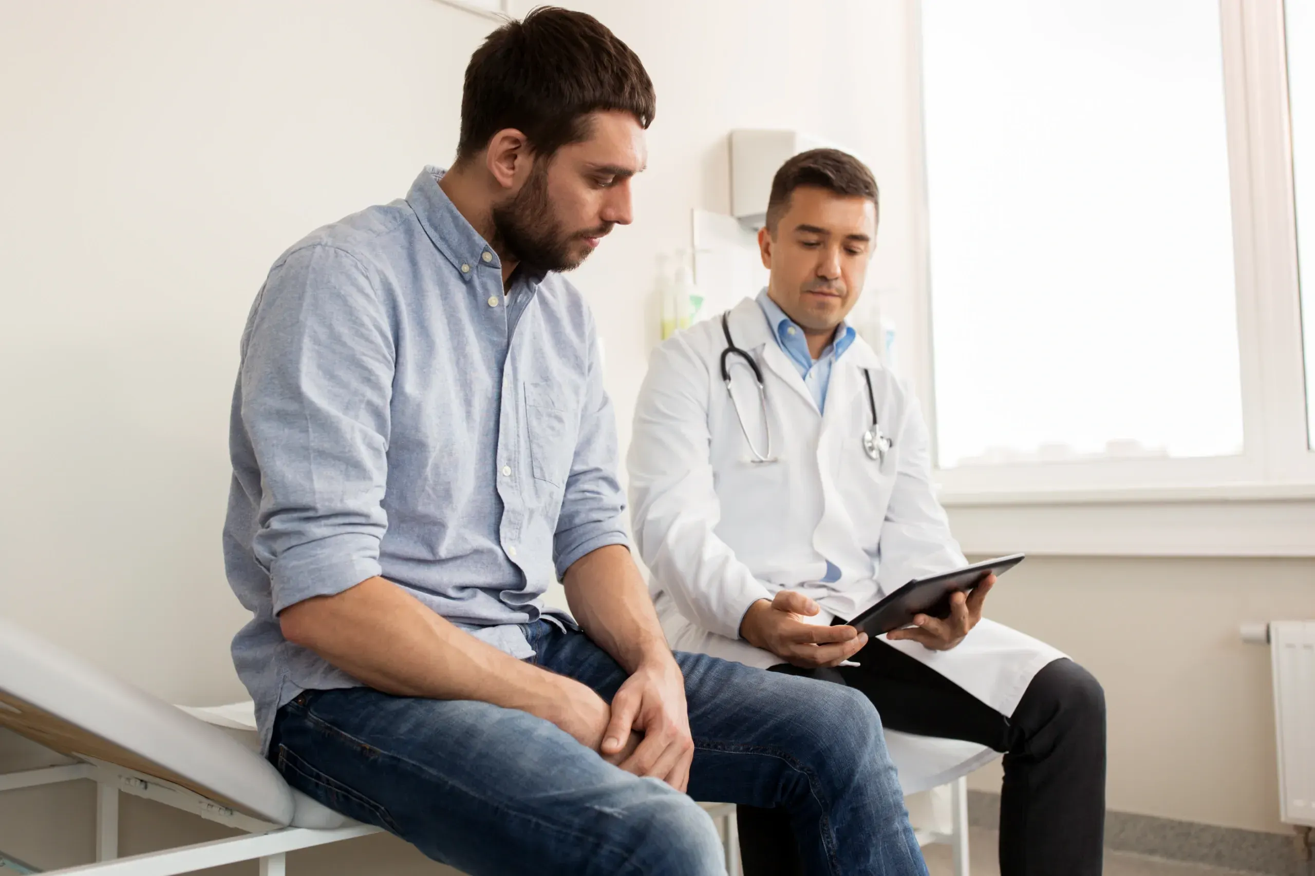 Abstract clinical background representing male reproductive health diagnostics at Zabinski Urology