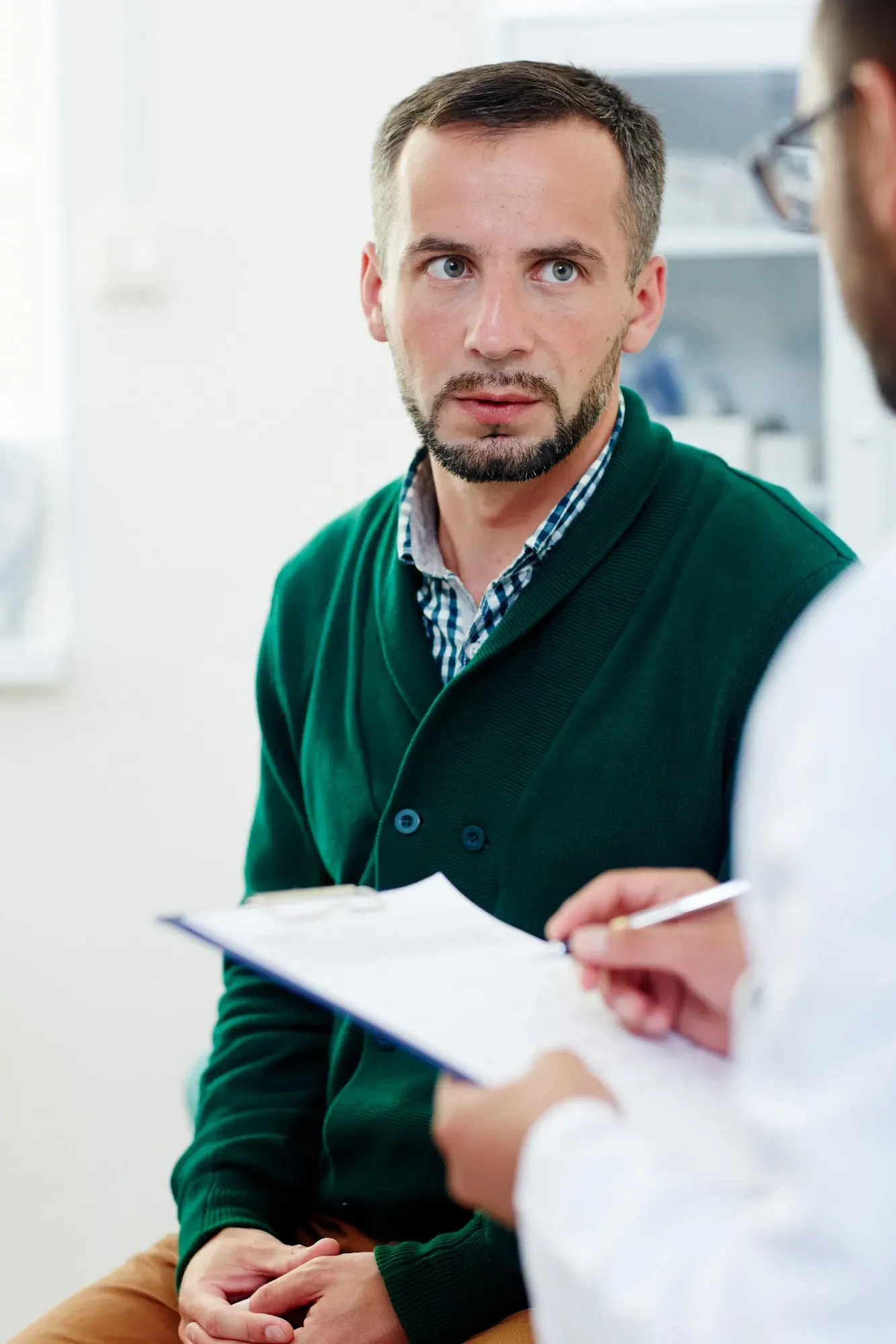 Clinical consultation discussing safety and considerations for male infertility testing at Zabinski Urology